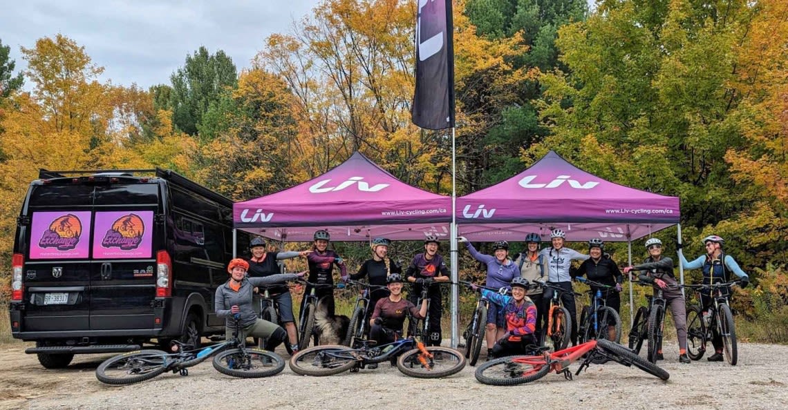 Three women mountain biking