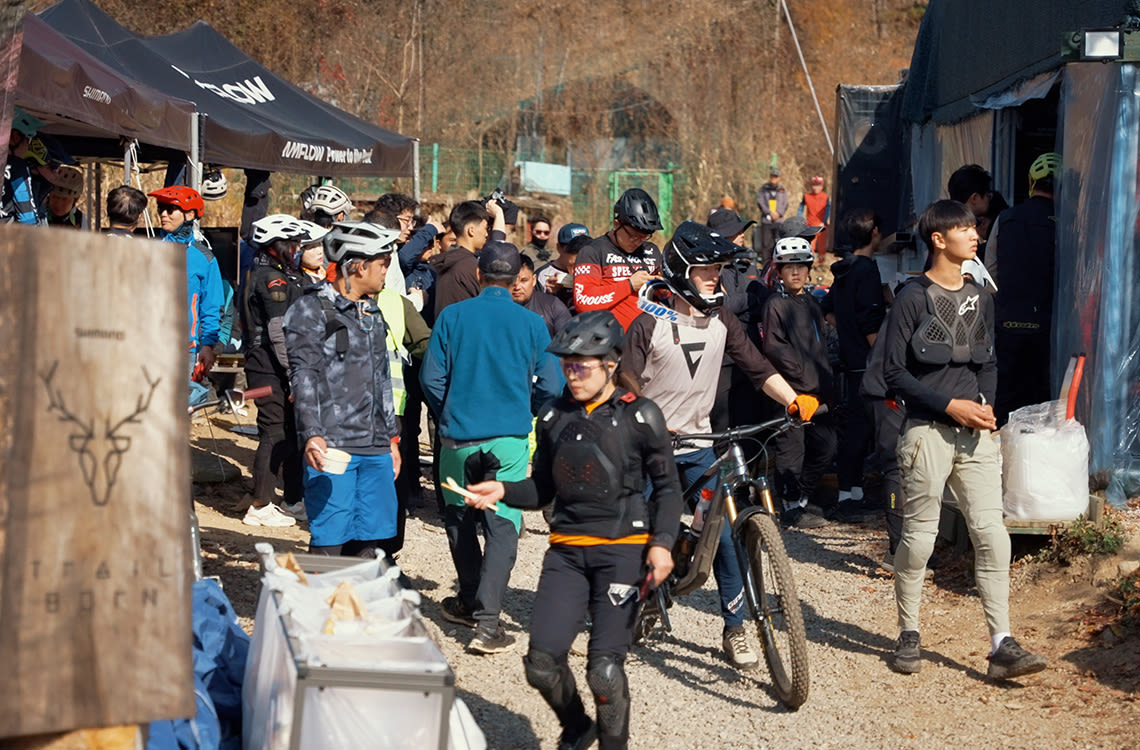 Sascha walking through a mountain bike festival.