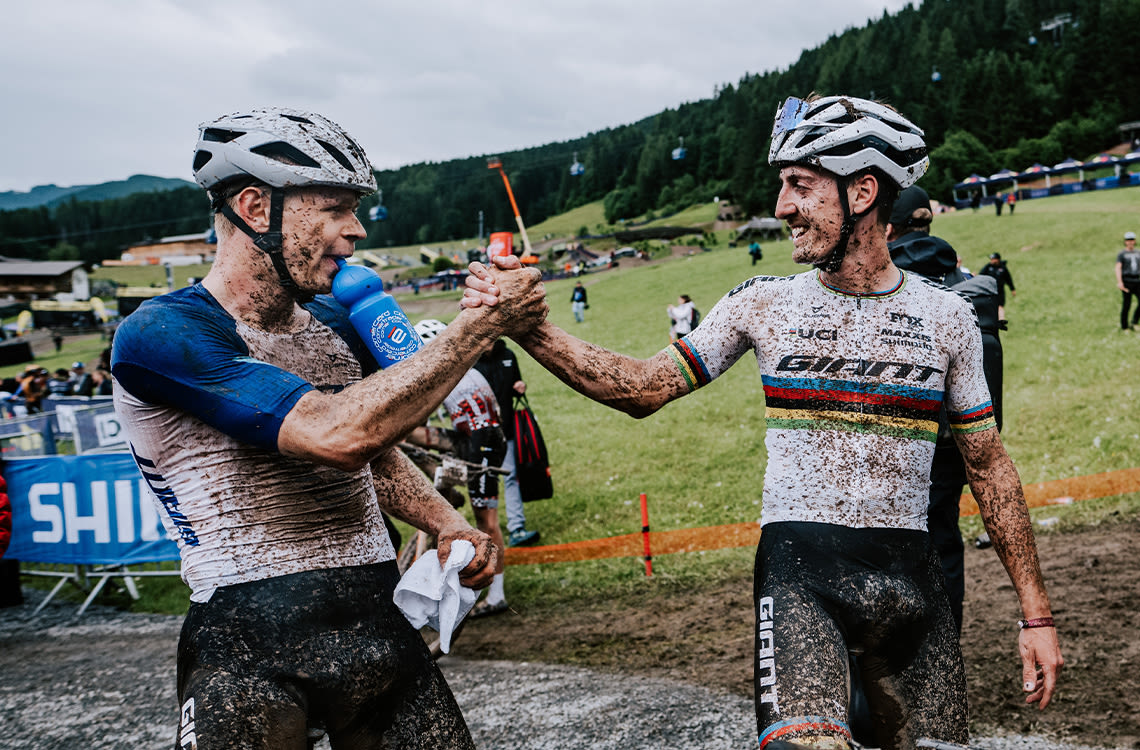 Alan Hatherly and teammate, Dario Lillo, celebrate after a great race result.