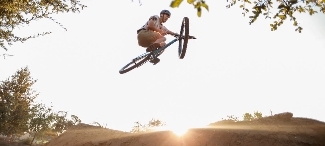 Huy Doan riding dirt jumps near Los Angeles