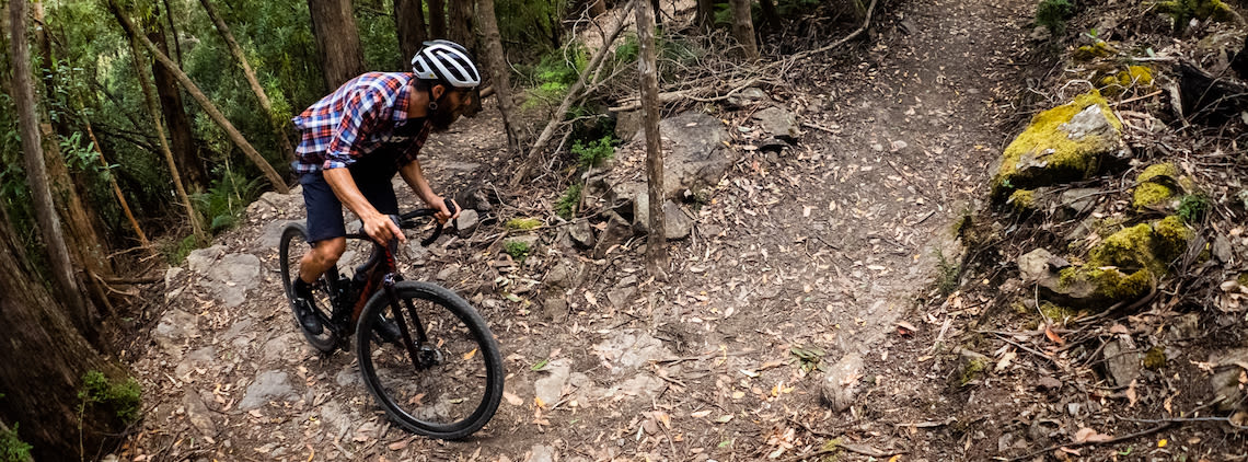 Beardy McBeard riding gravel in Tasmania, Australia 