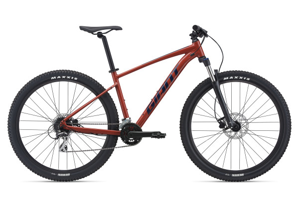 The Talon 2 model with 29-inch wheels and Red Clay color and graphics. Availability varies by market.