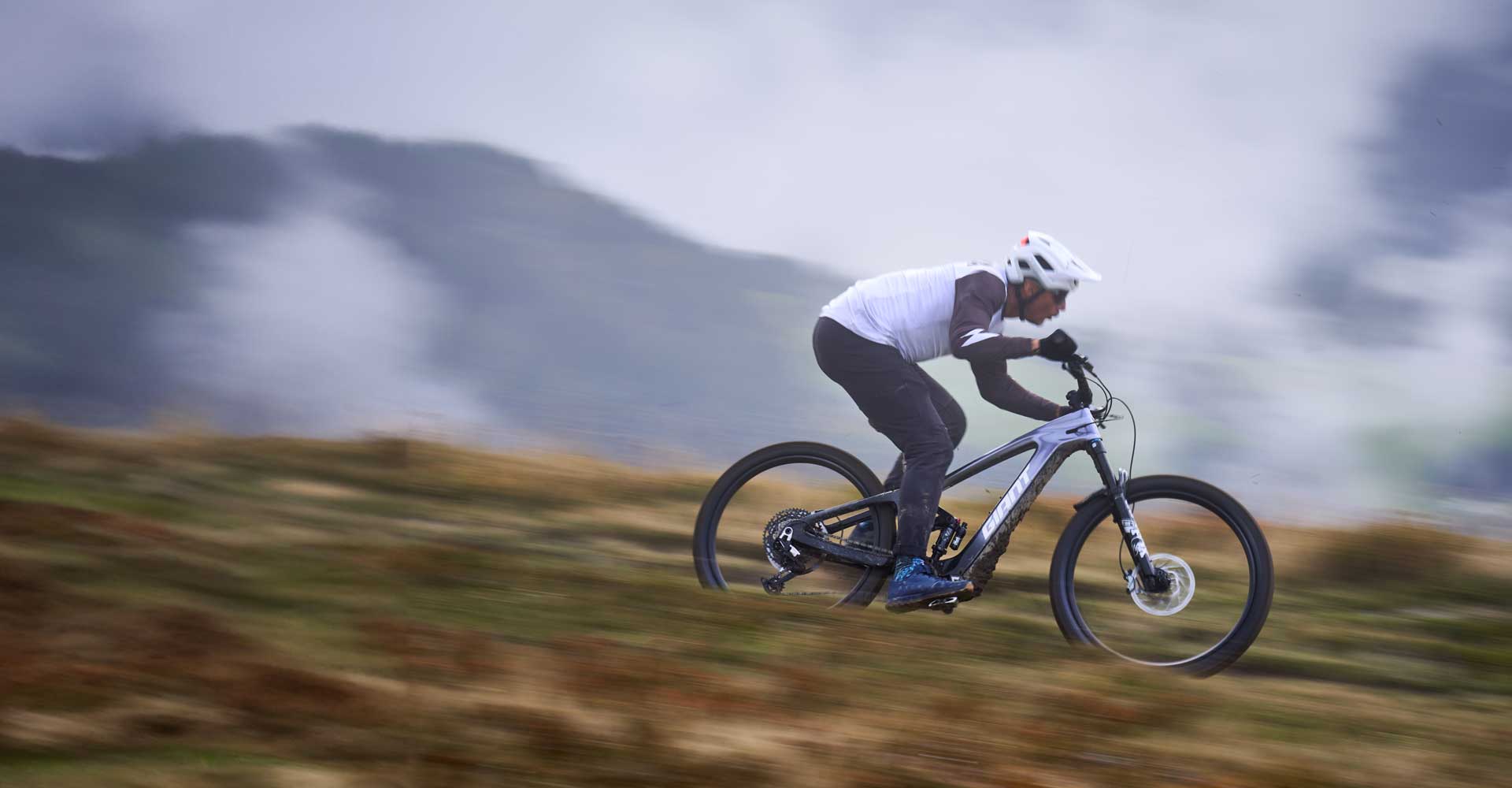 mountain biker with emtb on trail