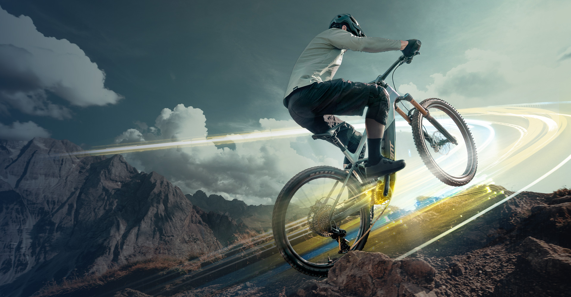 e-mountain biker performing a wheelie