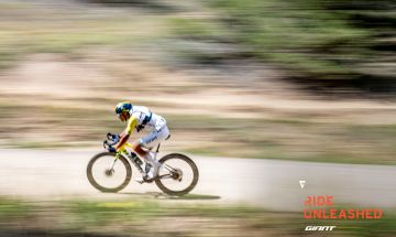 Gravel cyclist racing on a dirt path