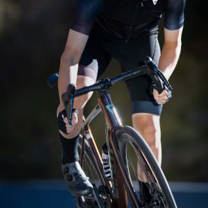 Cyclist approaches out of the saddle on Giant TCR Advanced SL 0.