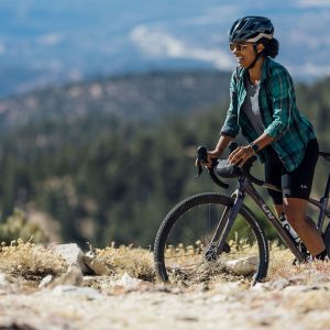 Woman standing with the Devote.