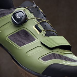 A close up look at the Giant Charge 2 gravel shoe in green.