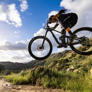 Woman riding the Intrigue LT Advanced Pro.