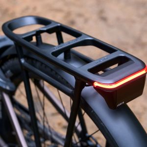 A close up look at the rear end of the AnyTour X E+ bike rack and integrated tail light.