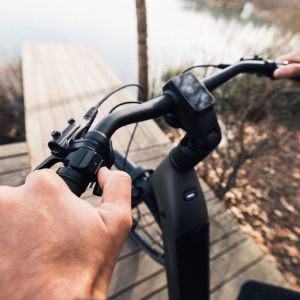 A close up POV of a rider sitting on their Giant AnyTour E+ electric city bike.