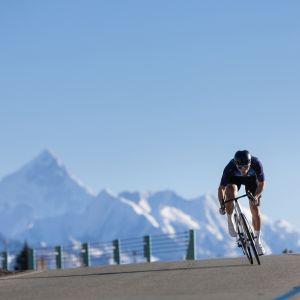Road cyclist riding Propel Advanced SL road bike in mountains