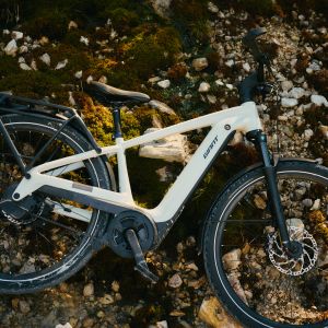 electric bike leaned against ground