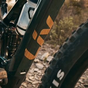 Woman riding the Intrigue X Advanced E+ Elite.