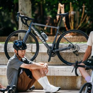 A group of cyclists sitting around their Giant Contend SL aluminum road bikes.