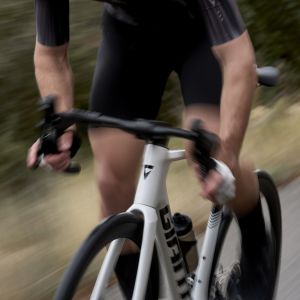 clsoeup of road cyclist on aero bike