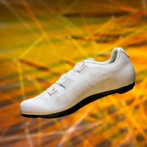 Liv Macha 1 road shoe in white on orange background.