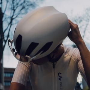 Top view of Girl wearing Liv Pursuit Mips helmet in white.