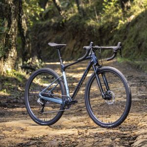 Revolt X gravel bike in front profile on a dirt road