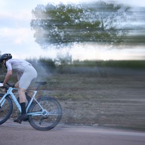 blurry shot of road cyclist sprinting