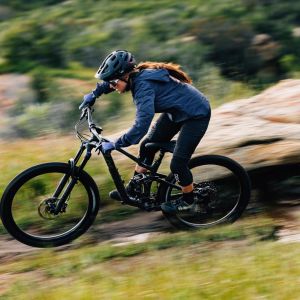 Woman riding the Intrigue LT Advanced Pro 1.