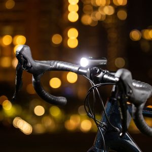 cast hl 500 headlight mounted to road bike handlebars