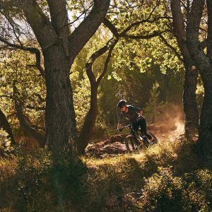 Woman riding the Intrigue X Advanced E+ Elite.