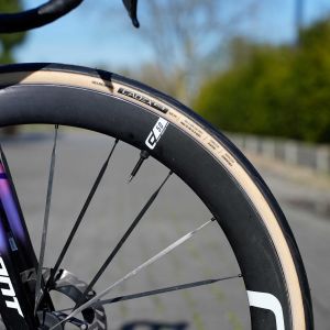 Close up look at CADEX aero cotton tire on a Cadex wheel.