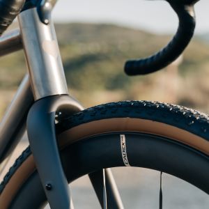 A close up look at the CADEX GXR Tire and how it fits in the fork of a gravel bike.