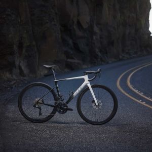 Endurance road bike positioned on winding road