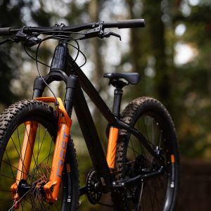 A close up angled view of the Giant STP 24 in the woods.