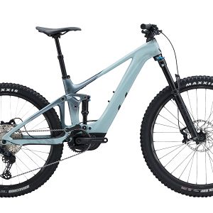 Woman riding the Intrigue X Advanced E+ Elite 2 in color Soap Suds.