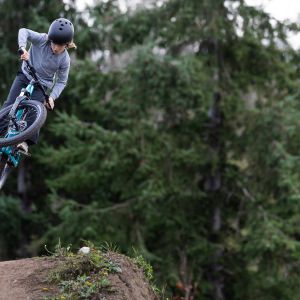 A young rider airs it out off a jump on a Giant STP 20.