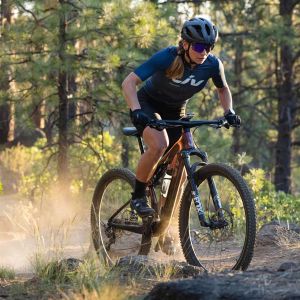 Rider on a dirt trail wearing Tesca Pro.