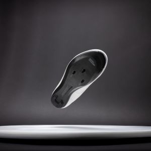 A close up look at the carbon bottom of the Giant Surge 1 road shoe.