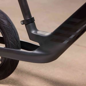 Close up view of the seat post and frame of Pre rCarbon strider bike.