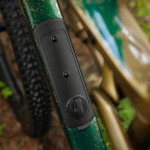 A close up look at the downtube storage of the Giant Anthem X Advanced SL in the forest.
