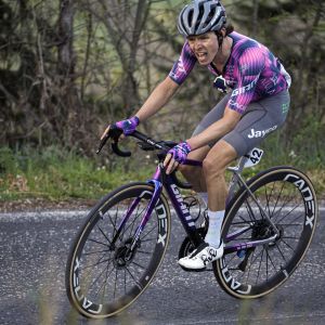 Jayco Alula pro cyclist in the middle of a hard effort on a Giant TCR with CADEX Aero Cotton Tires.