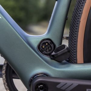 Charging port on lower seat tube of Giant Defy Advacned E+ Elite AR.