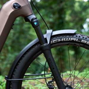 A close up look at the suspension fork on a Giant AnyTour X E+.