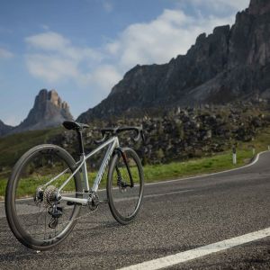 Giant Seek road bike fitted with Giant SLR 1 40 650b sized wheels on an alpine road.