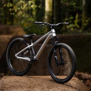 A Giant STP 26 staged in the forest at an angle.