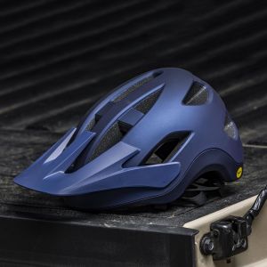 Roost helmet on tailgate of pickup