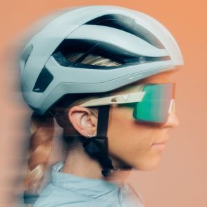 Side profile of girl wearing Liv Rev Pro Helmet.