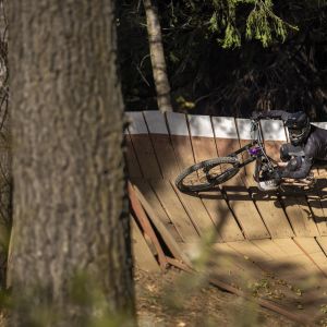 Enduro rider at bike park riding a Reign SX