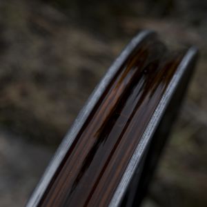 A close up look at the inner rim of a Giant XCR wheel staged on a trail.