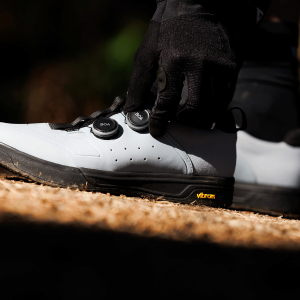 A mtber adjusts the BOA dial on their Giant Shuttle Clip BOA shoes.