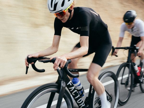 Cyclists putting in a big effort on a road ride