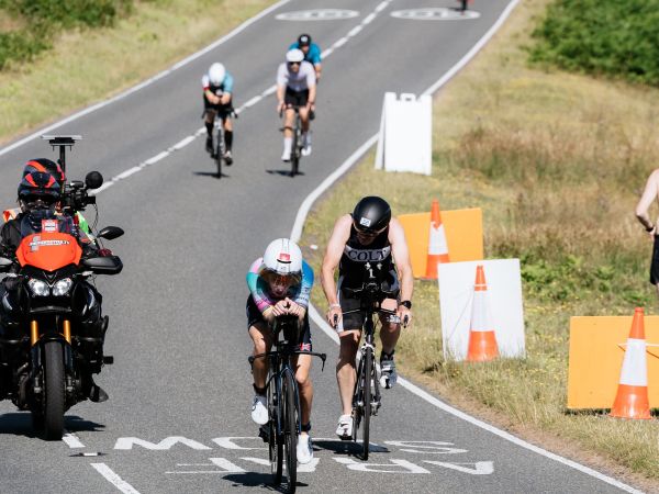 Athlete Lizzie winning Swansea Ironman