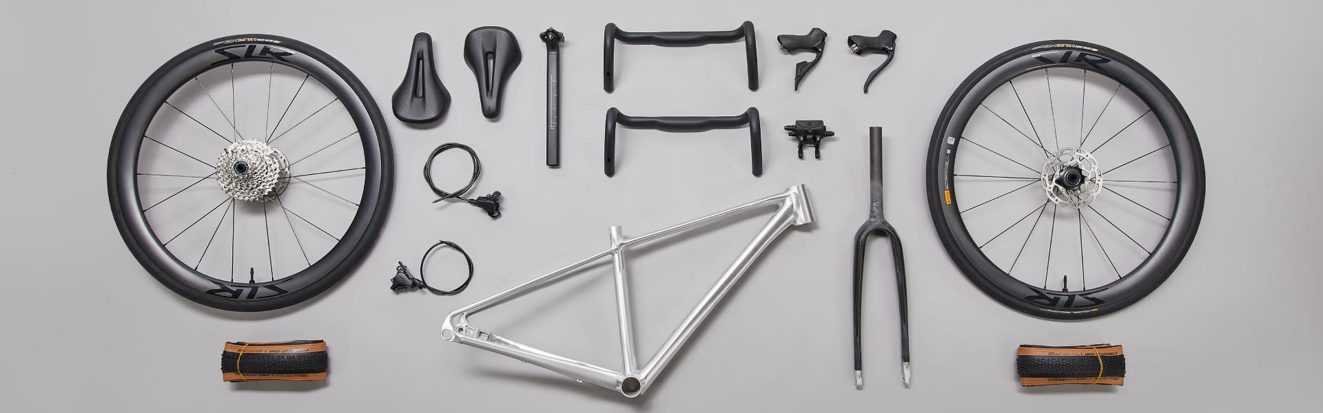 components disasmbled nearby a road bike